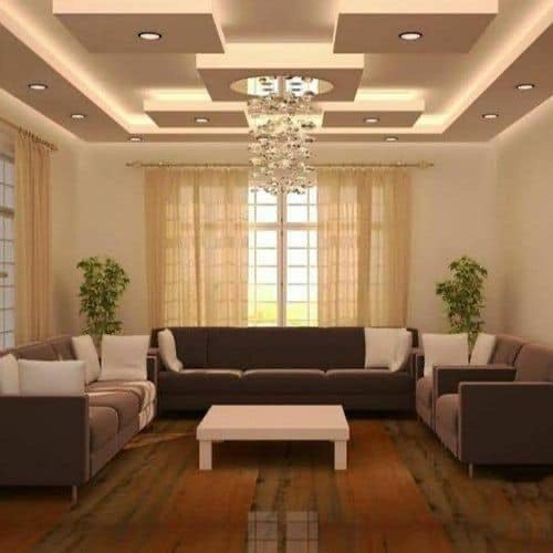 Classical living room with chandelier and LED tray ceiling by FreeCoat Decor Accra