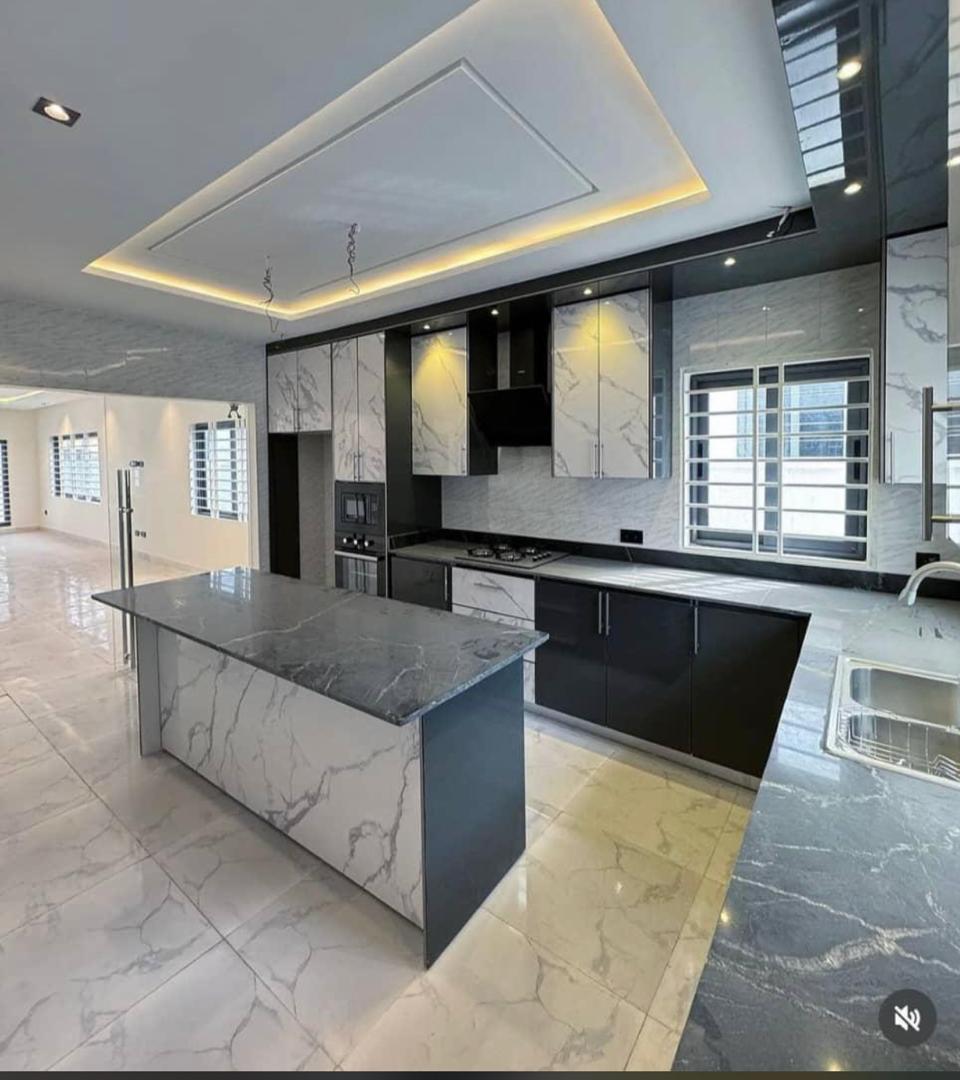 Modern grey kitchen cabinets with marble worktop by FreeCoat Decor